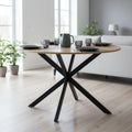 Table ronde repas six personnes avec pied araignee noir et plateau bois, diametre 110 cm, design contemporain